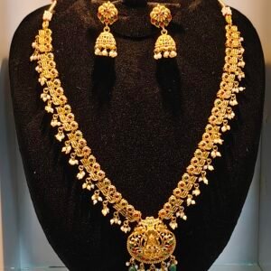 Traditional South Indian gold-plated Lakshmi necklace set with pearls and colored stones